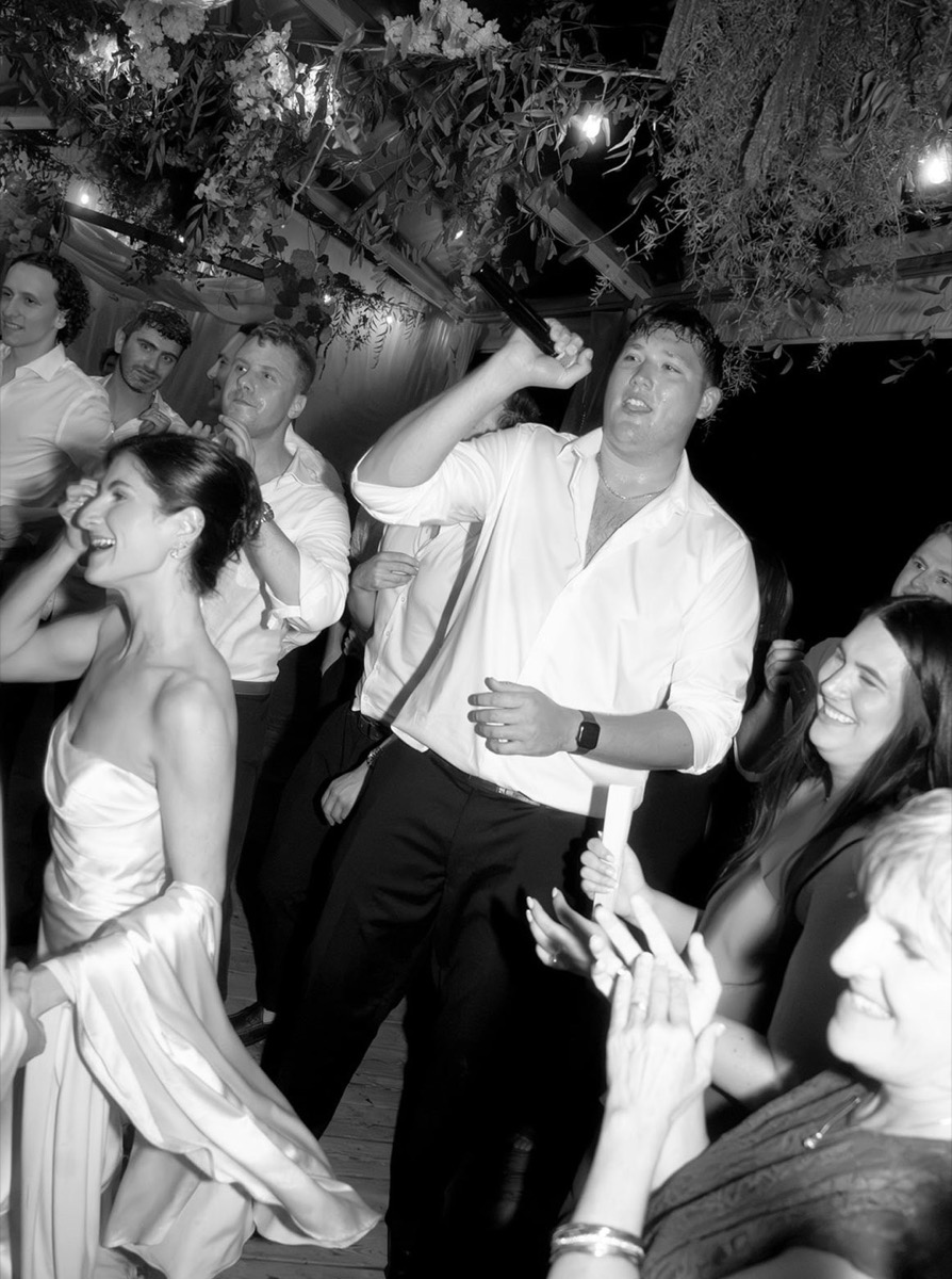MC Bloom performing at a wedding