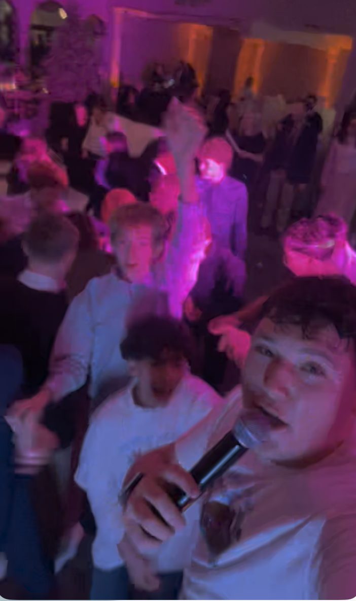 Students dancing at a school prom event